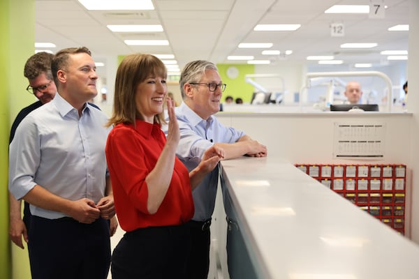 Britain's Prime Minister Keir Starmer, right, Chancellor Rachel Reeves and Health Secretary Wes Streeting during a visit to the Sir Ludwig Guttman Health & Wellbeing Centre in east London, Thursday, July 3, 2025. (Jack Hill/Pool Photo via AP