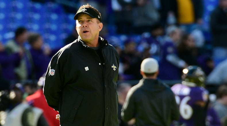 New Orleans Saints head coach Sean Payton watches his team warm up before the game against the Baltimore Ravens at M&T Bank Stadium.