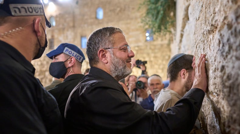 Israel's Minister of National Security, Itamar Ben-Gvir, prays during the mourning ritual of Tisha B'Av at the Western Wall, Judaism's holiest site, in Jerusalem's Old City, Wednesday, July 22, 2026. (AP Photo/Ohad Zwigenberg)
