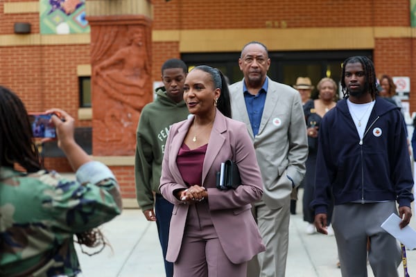 Democratic candidate for governor, and former Atlanta mayor, Keisha Lance Bottoms (center) leaves a voting precinct with her family after voting in the Georgia Democratic primary last week. (Jason Getz/AJC)