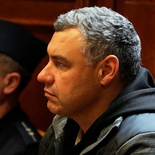 FILE - Ukrainian defendant Volodymyr Zhuravlov, right, listens as a judge announces the decision not to allow for extradition to Germany in courtroom of Warsaw's Regional Court in Warsaw, Poland, Friday, Oct. 17, 2025. (AP Photo/Czarek Sokolowski, File)