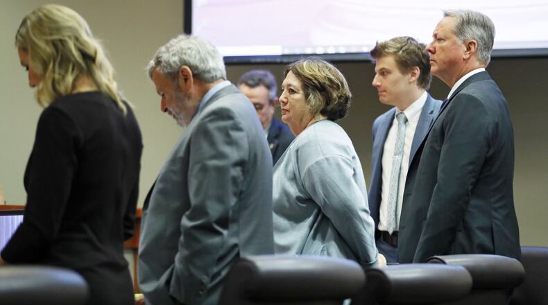 Former DeKalb County police officer Robert “Chip” Olsen (far right) stands with his attorneys (from left) Amanda Clark Palmer, Don Samuel, Denise de la Rue and Lukas Alfen in a Decatur courtroom on Monday, September 23, 2019, when jury selection began in his murder trial. Jury selection continued on Tuesday. Bob Andres / robert.andres@ajc.com