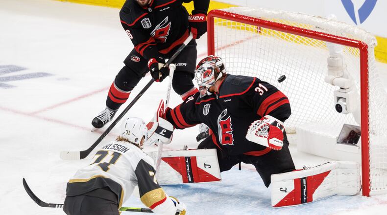 Vegas Golden Knights' William Karlsson (71) scores a goal past Carolina Hurricanes' Frederik Andersen (31) during the second period of Game 1 of the NHL hockey Stanley Cup Final series in Raleigh, N.C., Tuesday, June 2, 2026. (AP Photo/Ben McKeown)