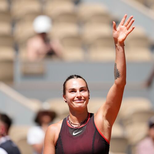 Aryna Sabalenka of Belarus celebrates after winning against Jessica Bouzas Maneiro of Spain during their first round women's singles tennis match at the French Open tennis tournament in Paris, Tuesday, May 26, 2026. (AP Photo/Christophe Ena)