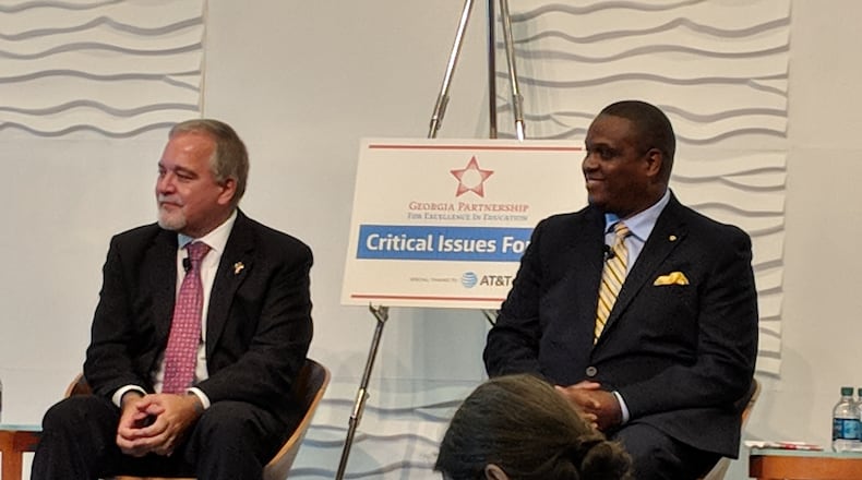 Republican state school Superintendent Richard Woods (left) at a candidate forum with challenger, Democrat Otha Thornton, at an event organized by the Georgia Partnership for Excellence in Education.