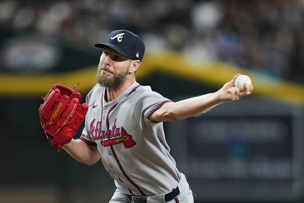 Braves starting pitcher Chris Sale throws against the Arizona Diamondbacks during the second inning Friday in Phoenix. “I felt like I was out there competing and not really just battling myself tonight,” Sale said. (Ross D. Franklin/AP)