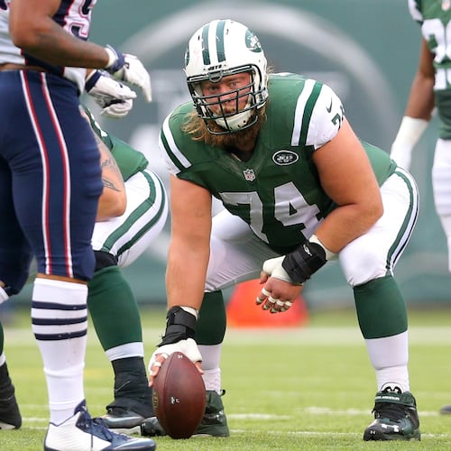 FILE - New York Jets center Nick Mangold (74) lines up against the New England Patriots during an NFL game at MetLife Stadium in East Rutherford, N.J. on Sunday, Dec. 27, 2015. (AP Photo/Brad Penner, File)