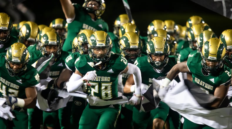 The Grayson Rams take the field during a GHSA high school football game between the Grayson Rams and the Brookwood Broncos at Grayson High School in Loganville, Ga. on Friday, October 22, 2021. (Jenn Finch/Special to the AJC)