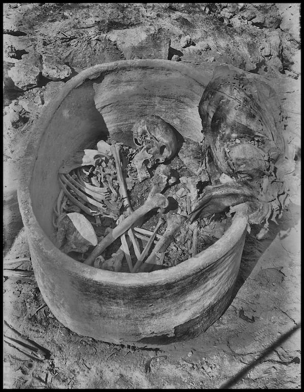 This photo provided by researchers shows a pottery vessel containing the remains of a man, radiocarbon dated to around 2855–2570 cal BCE, in Nuwayrat, Egypt. (Mahmoud Abd El Gelel/Garstang Museum of Archaeology/University of Liverpool via AP)