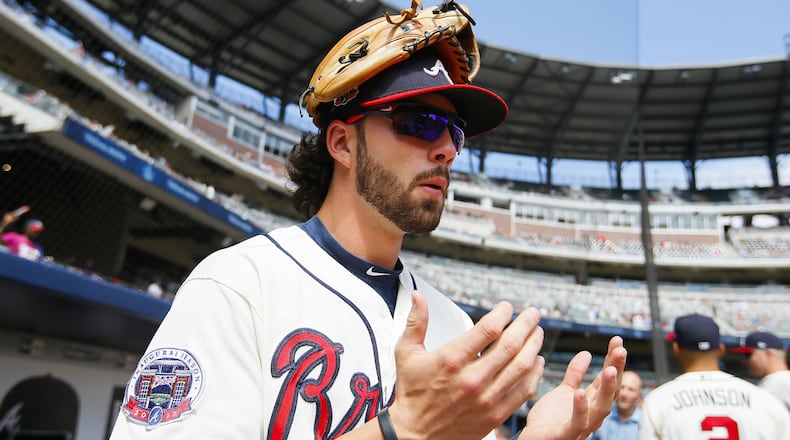 ATLANTA, GA - SEPTEMBER 24: Dansby Swanson #7 of the Atlanta Braves takes the field prior to the first inning of an MLB game against the Philadelphia Phillies at SunTrust Park on September 24, 2017 in Atlanta, Georgia. (Photo by Todd Kirkland/Getty Images)