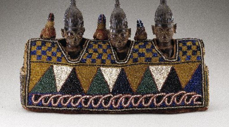 Female figures from the Yoruba people of Nigeria (early to mid-20th century) are included in the Carlos Museum exhibit "African Cosmos: Stellar Arts," opening Saturday.