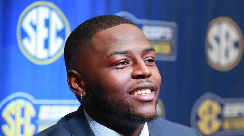 July 19, 2018 Atlanta: Auburn defensive lineman Dontavius Russell holds his SEC Media Days press conference at the College Football Hall of Fame on Thursday, July 19, 2018, in Atlanta. Curtis Compton/ccompton@ajc.com