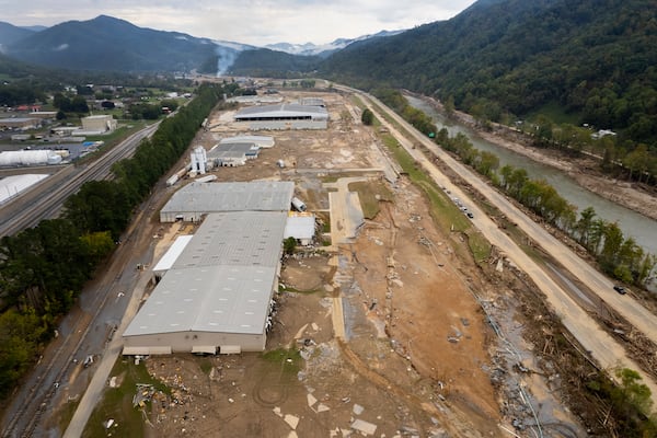FILE - The area around Impact Plastics Inc. is damaged from flooding during Hurricane Helene in Erwin, Tenn., Oct. 4, 2024. (AP Photo/Jeff Roberson, File)