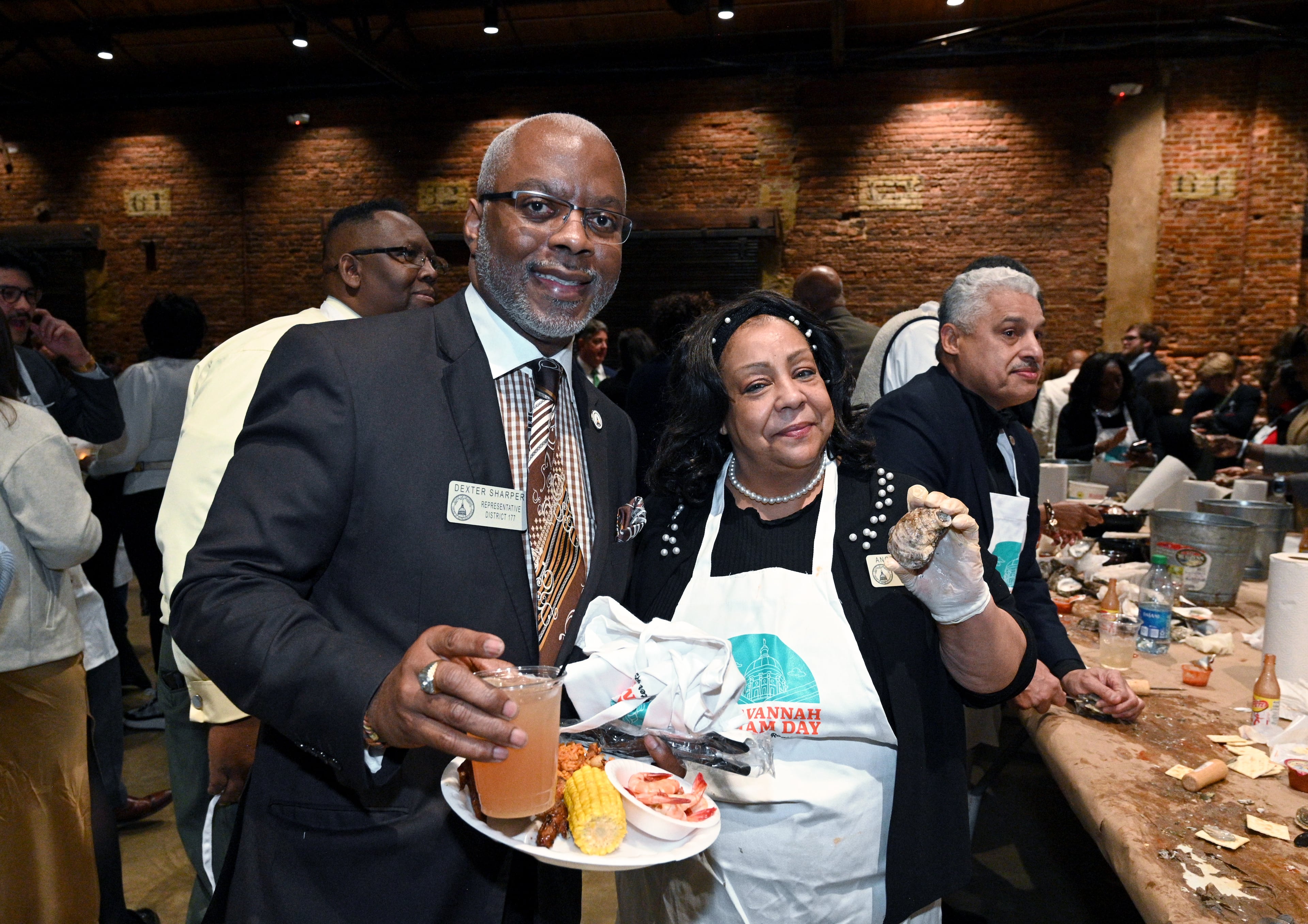 State Rep. Dexter Sharper (left), D-Valdosta, first took office in 2013. He is pictured with Rep. Angela Moore, D-Stonecrest.