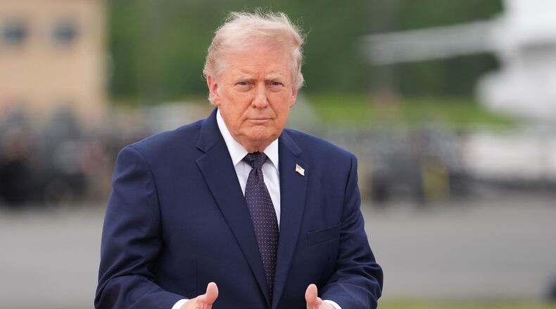 President Donald Trump walks from Marine One to board Air Force One at Morristown Airport, Friday, May 22, 2026, in Morristown, N.J. (AP Photo/Alex Brandon)