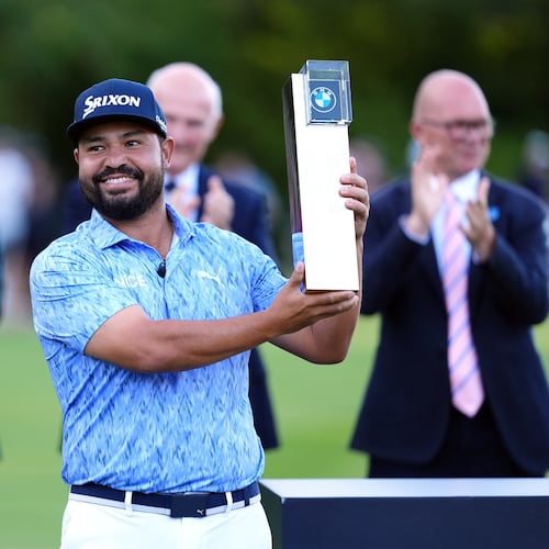 J. J. Spaun of United States lifts the trophy after winning the PGA Championship at Wentworth Golf Club in Virginia Water, England, Sunday Sept. 20, 2026. (Adam Davy/PA via AP)