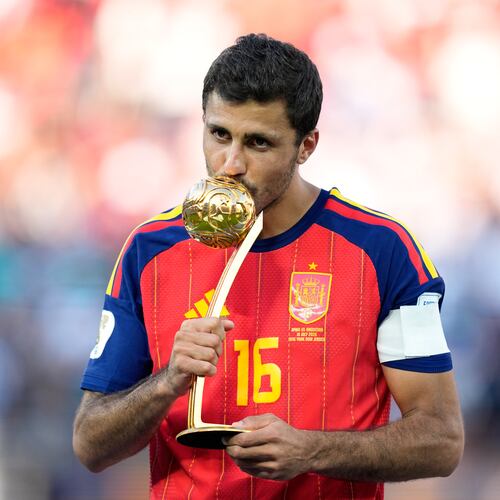 Spain's Rodri poses with the tournament's best player award at the end of the World Cup final soccer match between Spain and Argentina in East Rutherford, N.J., near New York, Sunday, July 19, 2026. (AP Photo/Ashley Landis)