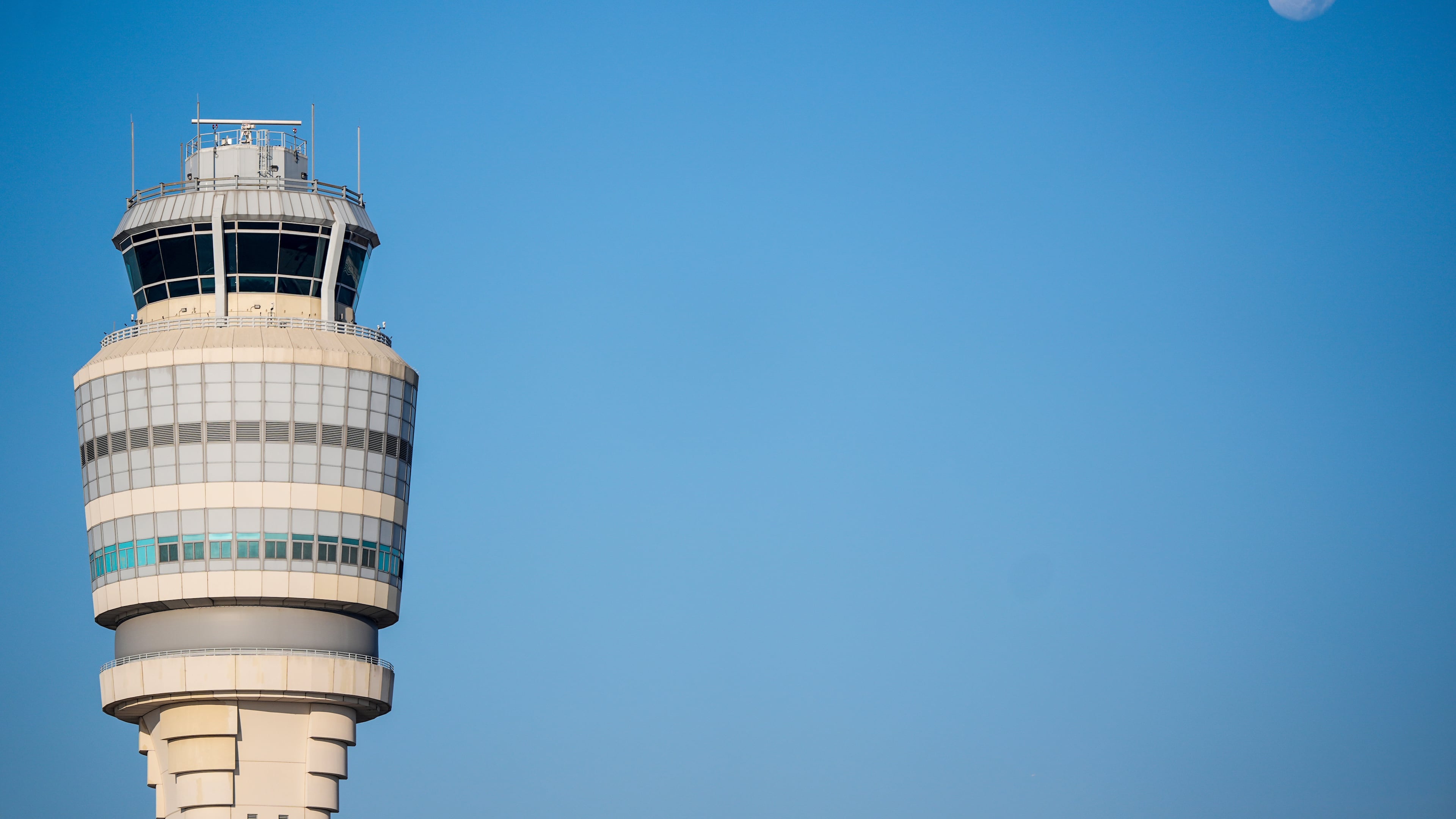 Several hundred flights were delayed and dozens of others were canceled Sunday after a weather-related ground stop at Hartsfield-Jackson Atlanta International Airport. (AP Photo/Mike Stewart)
