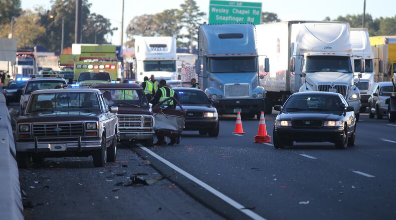A Good Samaritan that stopped to help a motorist with a flat tire was struck and killed on I-20 Friday afternoon in DeKalb County, police said.