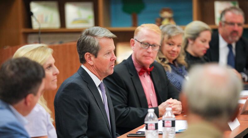 Gov. Brian Kemp met with education officials at Ball Ground Elementary School on Aug. 6, 2021. In 2022, he will use federal COVID-19 school relief funding to give every teacher $125 for classroom expenses. (Special)