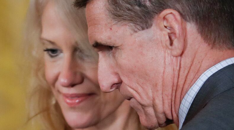Former National Security Adviser Michael Flynn and Counselor to the President Kellyanne Conway take their seats before the start of a joint news conference with President Donald Trump and Canadian Prime Minister Justin Trudeau in Washington on Monday. AP /Pablo Martinez Monsivais