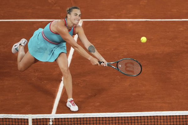 Aryna Sabalenka of Belarus returns the ball to Russia's Kamilla Rakhimova during their first round match of the French Tennis Open at the Roland Garros stadium, in Paris, Sunday May 25, 2025. (AP Photo/Lindsey Wasson)