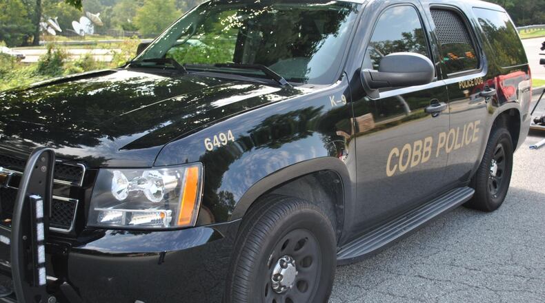 A driver attempting to flee a Cobb County officer was killed in a crash early Monday, according to police.