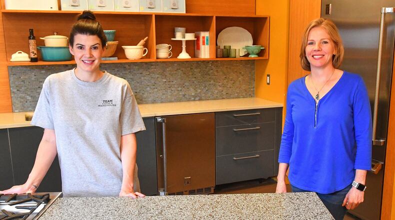 Nealey Thompson (left), Cook’s Warehouse’s cooking school director, and Cook’s Warehouse founder and CEO Mary Moore.