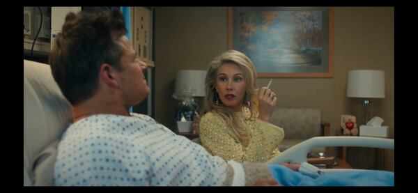 Wynn Everett plays Tricia Yeager, a loud, opinionated, rich Southern woman who runs the boosters of a college football team in "Chad Powers," which also stars (left) Steve Zahn as the football coach Jake Hudson. (Hulu)