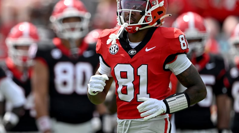 Georgia wide receiver Craig Dandridge — pictured warming up at the G-Day spring football game in April — may contribute early as the No. 81 overall player among 2026 recruits. (Hyosub Shin/AJC)