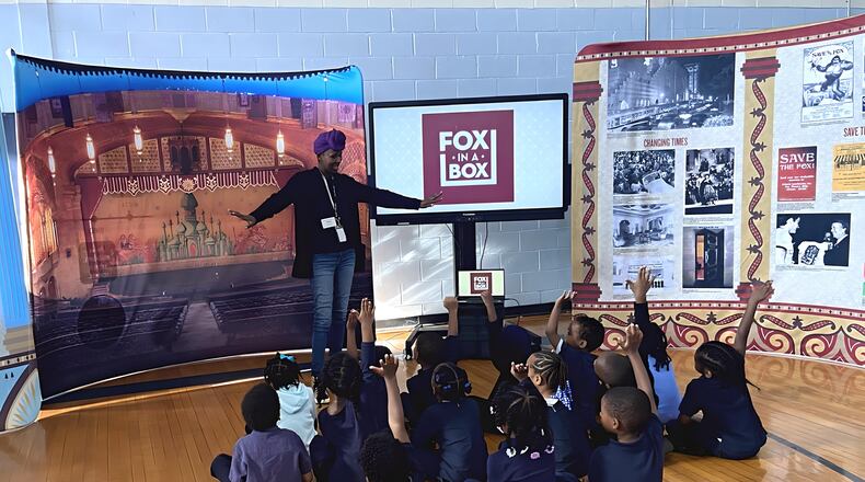 Fox in a Box teaching assistant Nicole Davis brings arts lessons to students at the Mohammed Schools of Atlanta. Courtesy