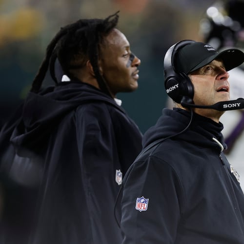 Baltimore Ravens head coach John Harbaugh watches during the first half of an NFL football game against the Green Bay Packers, Saturday, Dec. 27, 2025, in Green Bay, Wis. (AP Photo/Matt Ludtke)