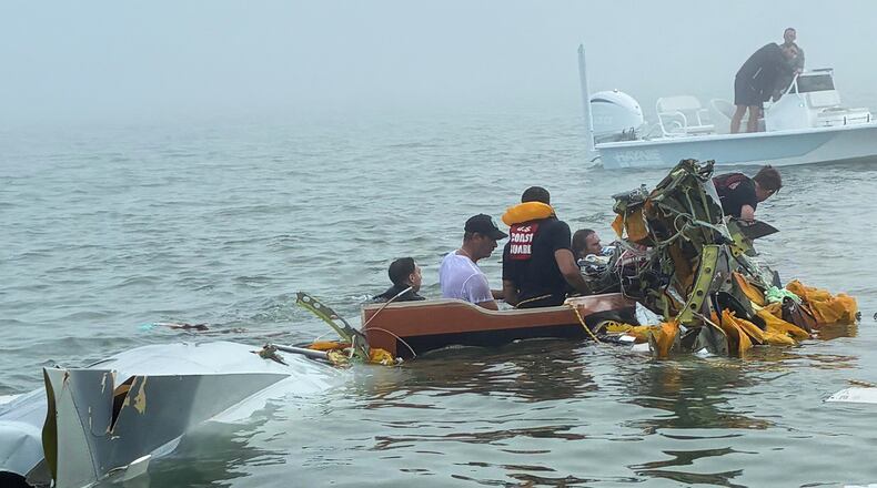 In this image provided by Sky Decker Jr., authorities and volunteers respond to a Mexican Navy plane crash near Galveston, Texas, Monday, Dec. 22, 2025. (Sky Decker Jr. via AP)null