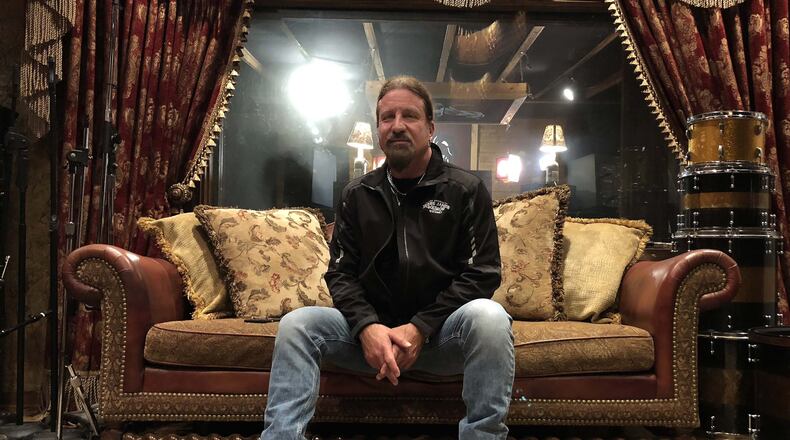 Jesse James Dupree, shown in his Kennesaw studio in Decemeber 2018, has recorded a tribute to the trucking industry. RYON HORNE / RHORNE@AJC.COM