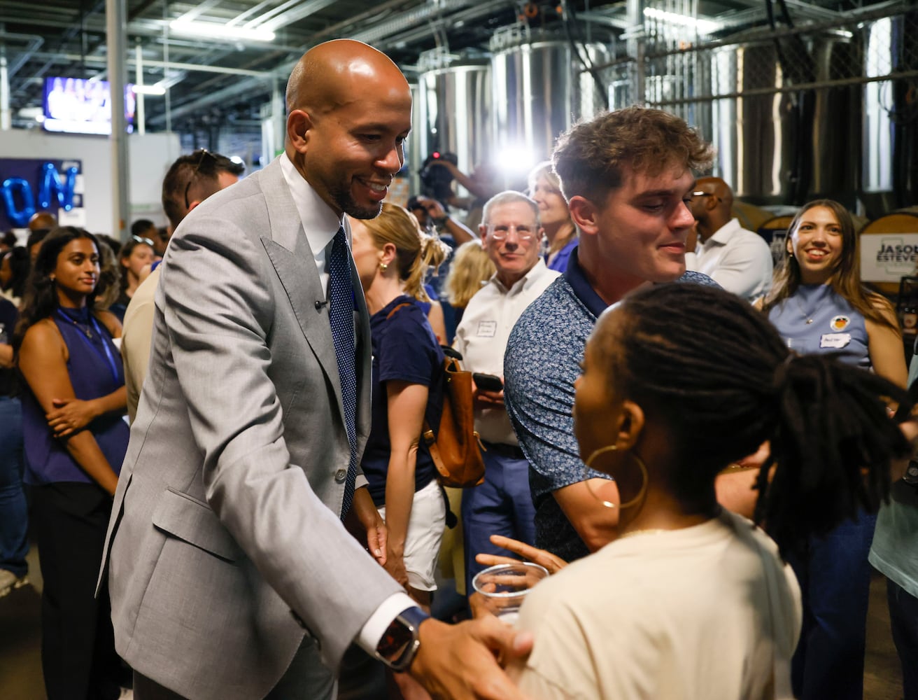 Jason Esteves greets supporters at his watch party for the governor's race at Scofflaw Brewing Co., in Atlanta on Tuesday, May 19, 2026, during the 2026 Georgia primary elections.(Bob Andres for the AJC)