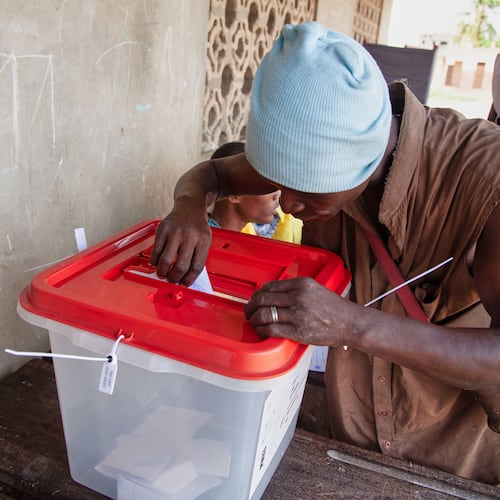 A man casts his ballot at a polling station in Cotonou, Benin, Sunday, April 12, 2026. (AP Photo/Abadjaye Justin Sodogandji)