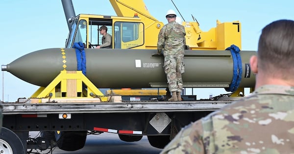 FILE - In this photo released by the U.S. Air Force on May 2, 2023, airmen look at a GBU-57, or the Massive Ordnance Penetrator bomb, at Whiteman Air Base in Missouri.(U.S. Air Force via AP, File)