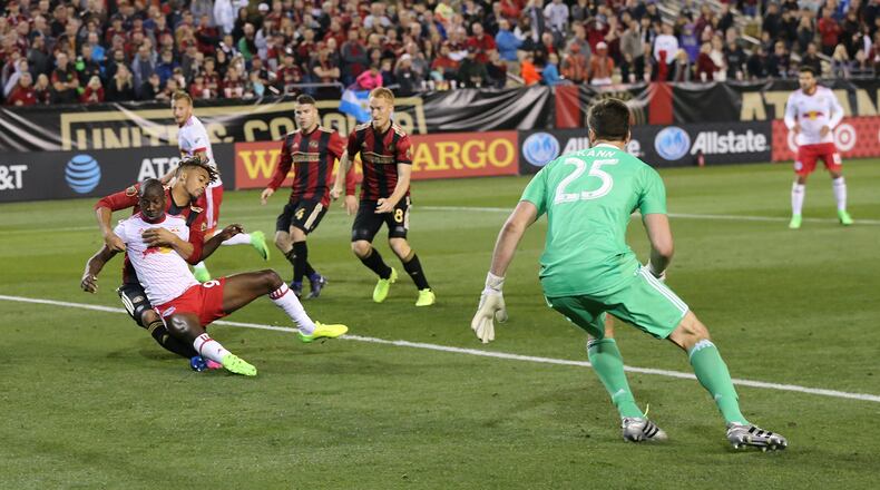 March 5, 2017, Atlanta: Atlanta United RC goalkeeper Alec Kann looks on as N.Y. Red Bulls Bradley Wright-Phillips scores the winning goal for a 2-1 victory during the second half in their first game in franchise history on Sunday, March 5, 2017, in Atlanta.   Curtis Compton/ccompton@ajc.com