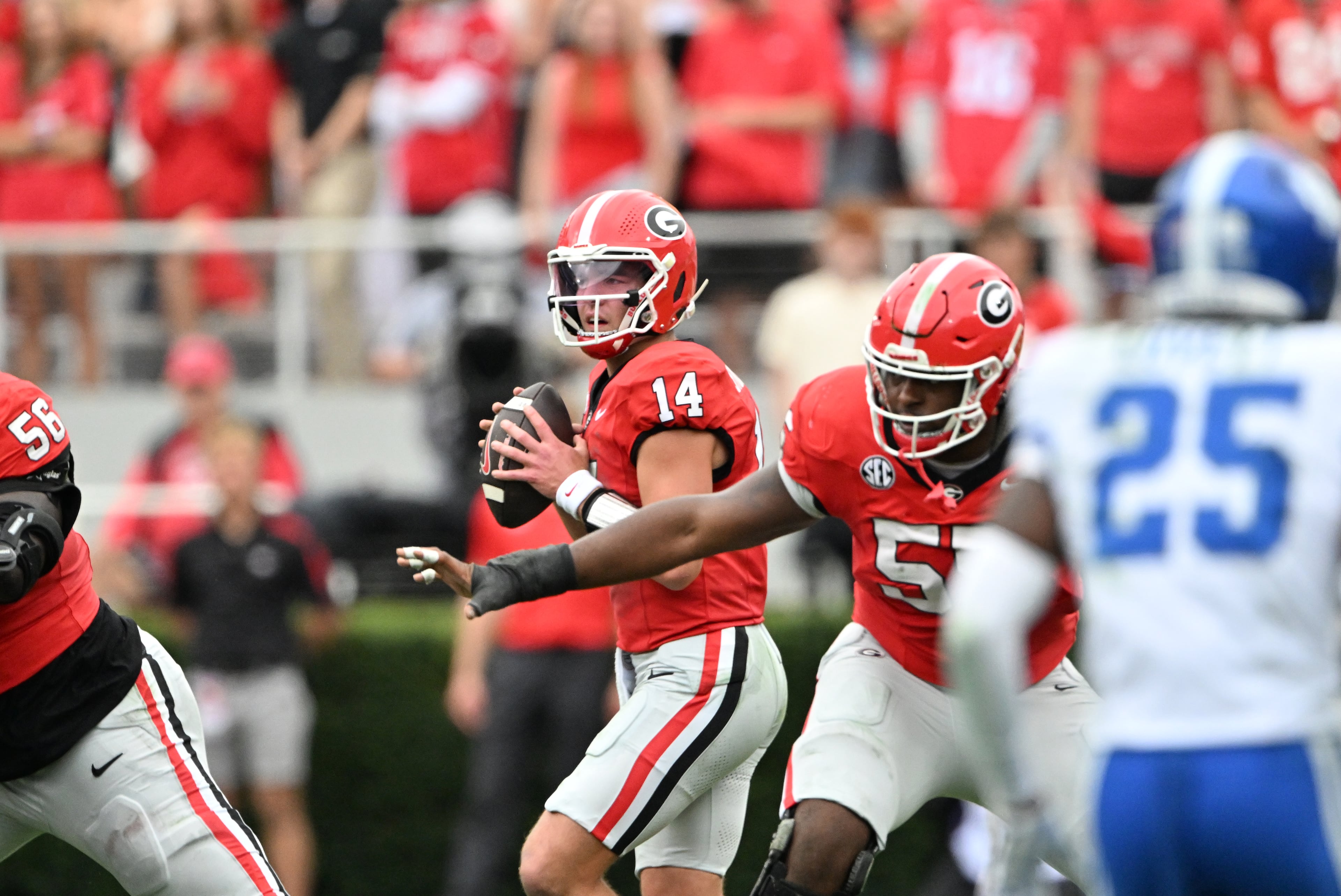 Georgia quarterback Gunner Stockton (14) prepares to get off a pass during the first half in a NCAA college football game at Sanford Stadium, Saturday, October 4, 2025, in Athens. (Hyosub Shin / AJC)
