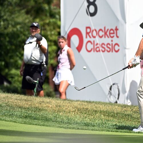 Cameron Young chips onto the eighth green during the first round of the Rocket Classic golf tournament at the Detroit Golf Club, Thursday, July 30, 2026, in Detroit. (AP Photo/Jose Juarez)