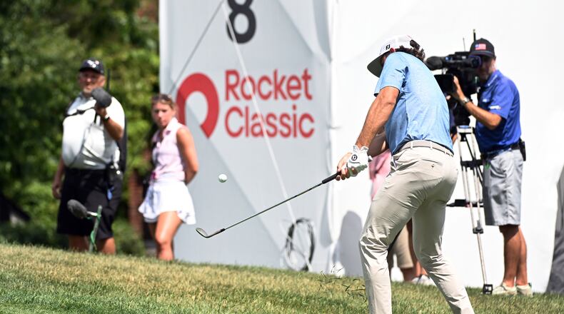 Cameron Young chips onto the eighth green during the first round of the Rocket Classic golf tournament at the Detroit Golf Club, Thursday, July 30, 2026, in Detroit. (AP Photo/Jose Juarez)