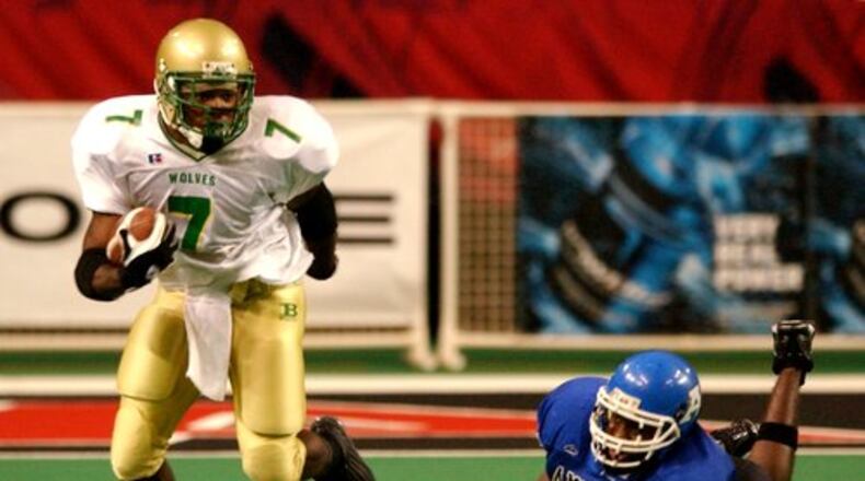 Darius Walker was an all-state running back for Buford when the Wolves won 47 consecutive games from 2001 to 2004.