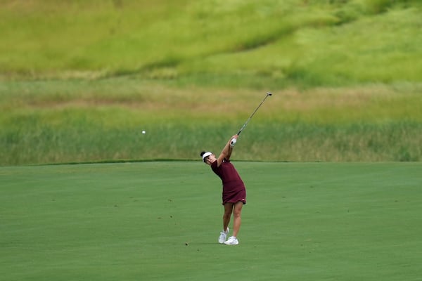 Lucy Li hits on the eighth hole during the first round of the Chevron Championship LPGA golf tournament Thursday, April 24, 2025, in The Woodlands, Texas. (AP Photo/Eric Gay)