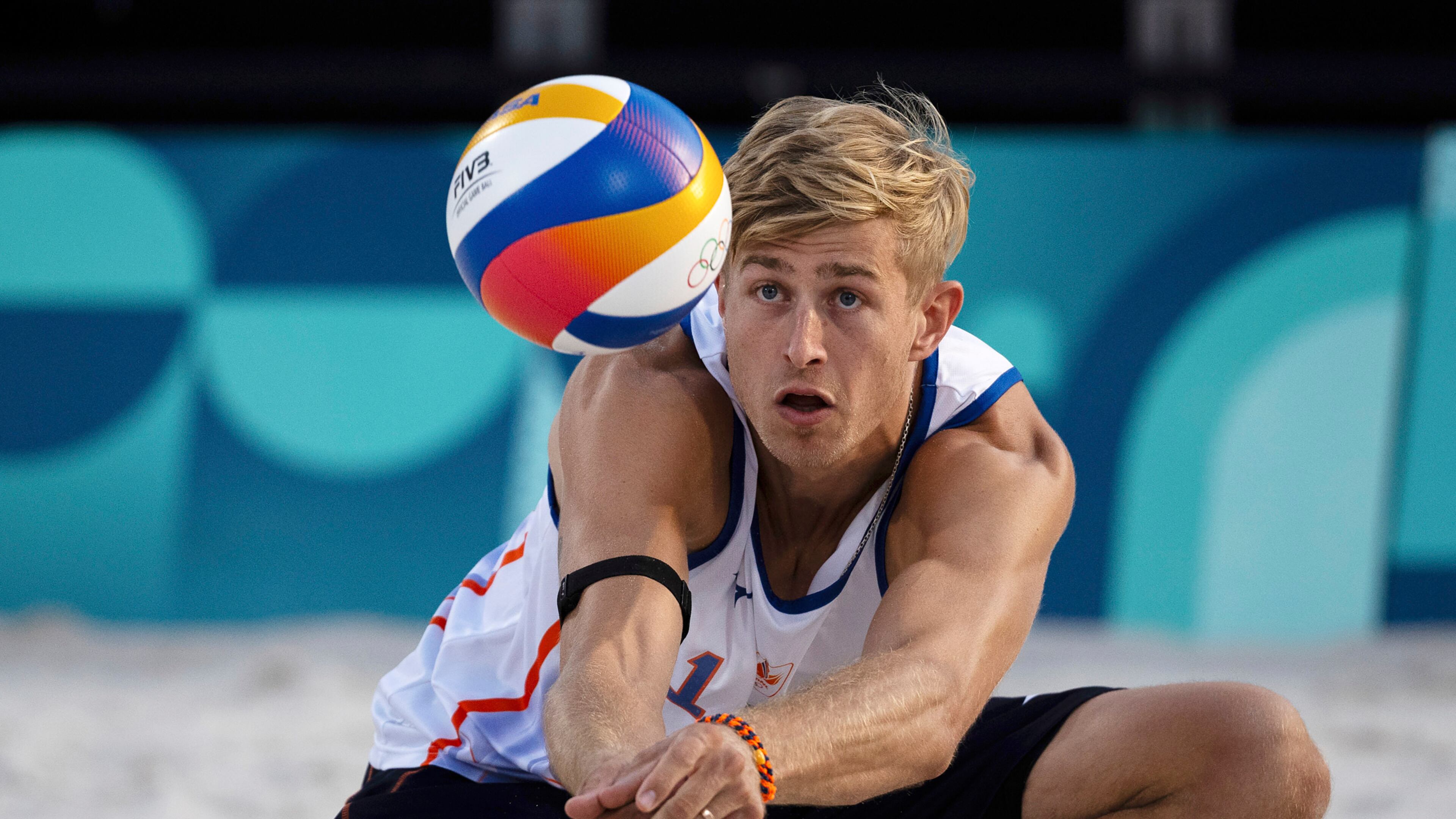 FILE - Netherlands' Steven Van De Velde hits the ball during the men's Pool B beach volleyball match between Norway and the Netherlands at Eiffel Tower Stadium at the 2024 Summer Olympics, Aug. 2, 2024, in Paris, France. (AP Photo/Louise Delmotte, File)