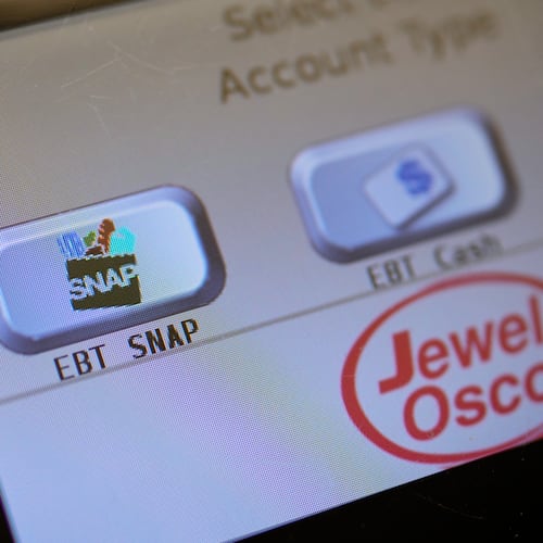 FILE - An EBT SNAP sign is shown on a self check out screen at a grocery store in Mount Prospect, Ill., Saturday, Nov. 1, 2025. (AP Photo/Nam Y. Huh, File)