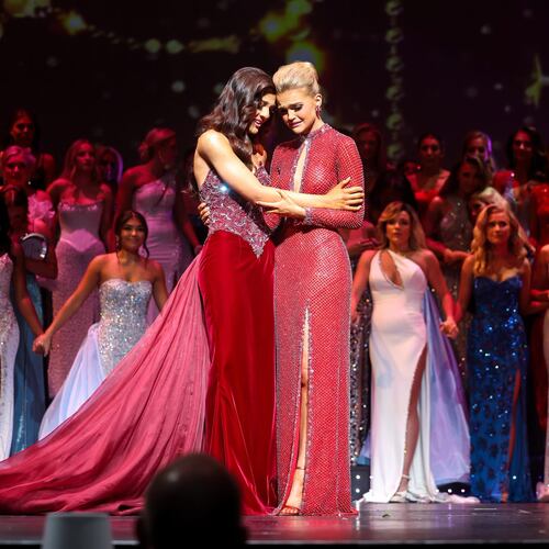 Aleks Arwood (right) and Sophia Wootten embrace before the crowning moment of the Miss Georgia Scholarship Competition on June 20, 2026 at RiverCenter for the Performing Arts in Columbus. (Courtesy of Sheldon Smith Photography)