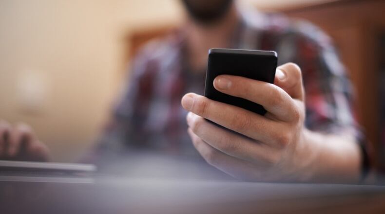 Roswell has announced a “Text to 911” system in which people can text for help to the city’s 911 Center. AJC FILE