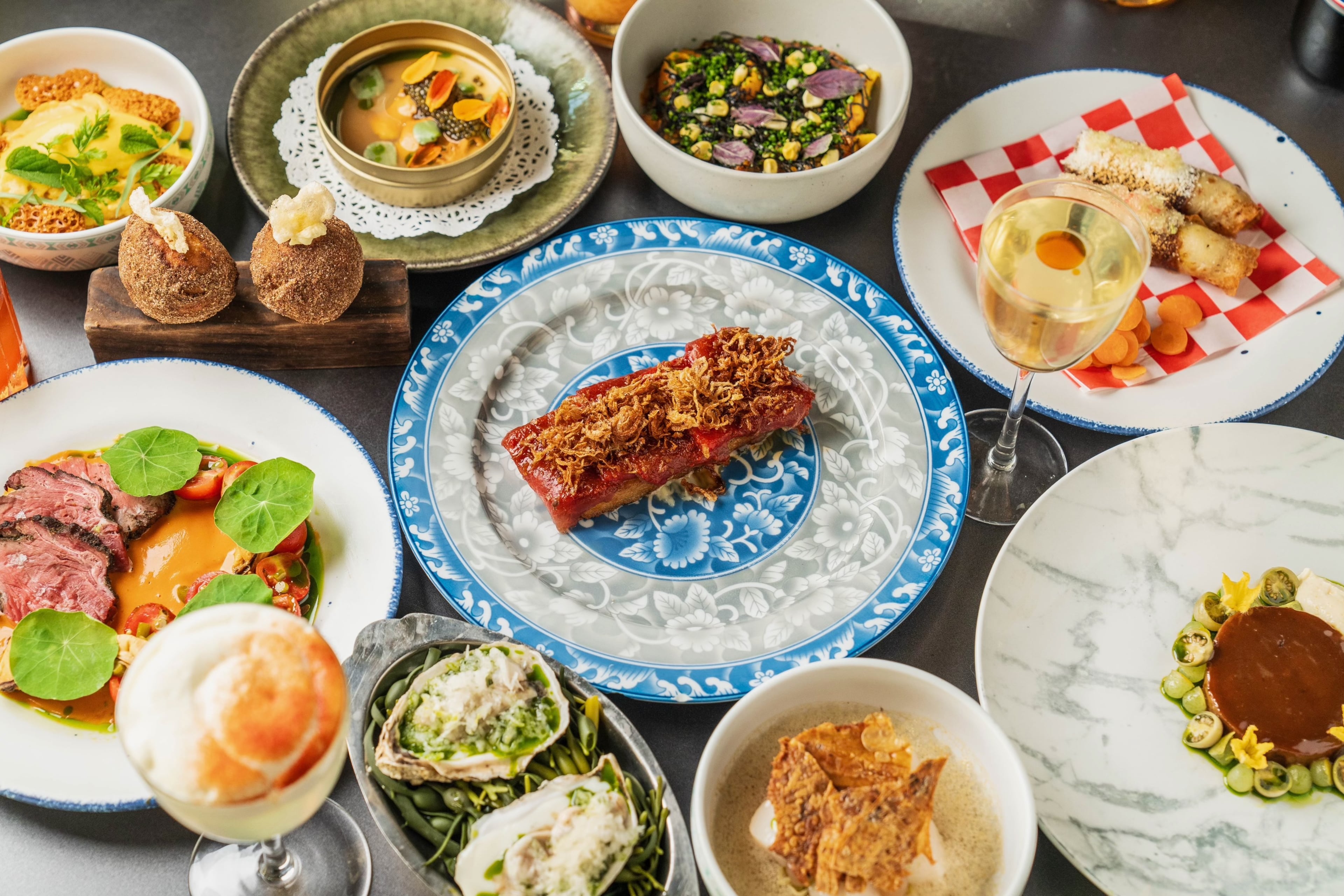 Twelve years ago, Kevin Gillespie’s idea of serving modern Southern bites and sips dim sum-style seemed wild and crazy. Now, Gunshow is the dining equivalent of such Atlanta attractions as the Georgia Aquarium, World of Coca-Cola and Centennial Olympic Park. (Courtesy of Blake Studwell)
