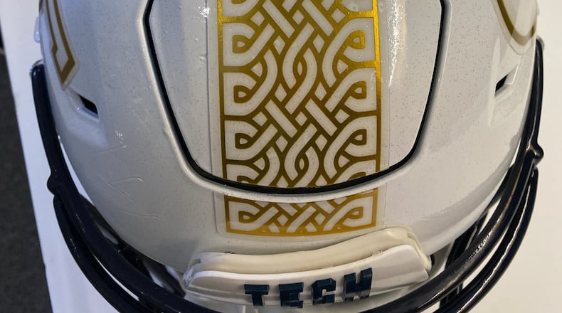 Georgia Tech revealed the helmet decal that it will wear in Saturday's season opener against Florida State in Dublin. The Yellow Jackets will have a white and gold decal down the center of the helmet in the form of a Celtic knot, paying homage to the game's Irish hosts. (AJC photo by Ken Sugiura)