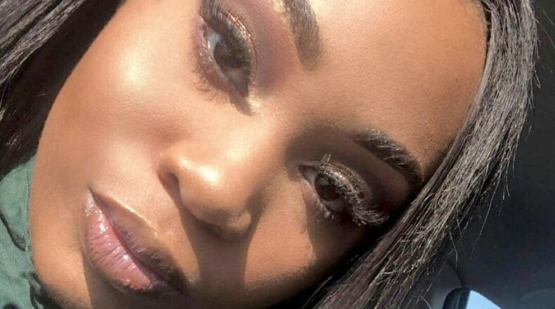 Elyse Purefoy, 17, was at Arabia Mountain High School when she collapsed on the track during dance team practice. Family photo